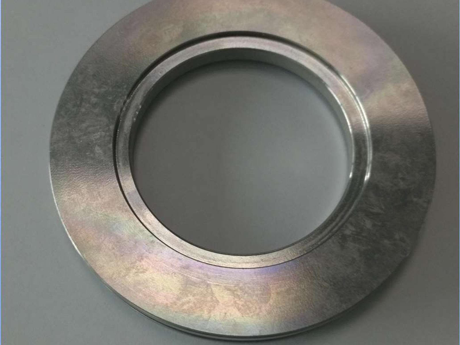 Precision sintered bearing seat ring with machined inner surface